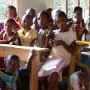 The children in the classroom.